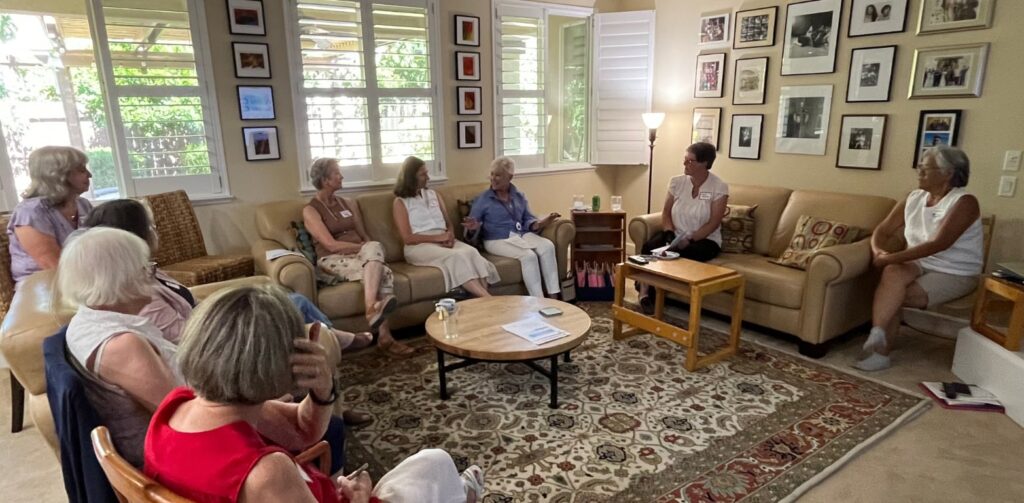 Nine women in a living room