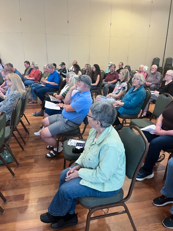 audience of local citizens